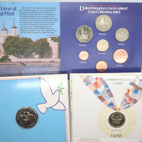 3091 - 1985 and 1986 Royal Mint two pounds commemorative coins in sleeves and a 1983 Royal Mint uncirculate... 