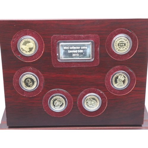 3119 - Cased set of seven gold plated mini collectors coins c2010, from a limited run of 500. P&P Group 1 (... 