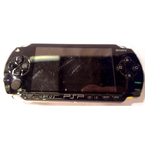 2203 - Sony PSP handheld console (lacking charger, games etc). P&P Group 1 (£14+VAT for the first lot and £... 