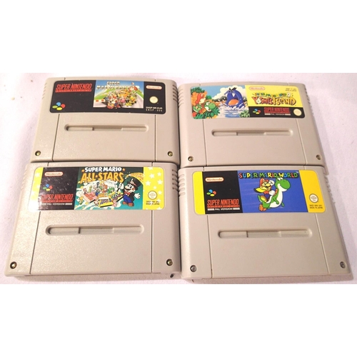 2205 - Four Super Nintendo games; Super Mario World, Yoshis Island, Super Mario Kart and Super Mario Allsta... 