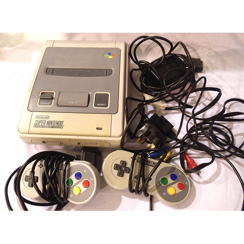 2206 - Super Nintendo console with x2 control pads, leads, Transformer etc. P&P Group 1 (£14+VAT for the fi... 