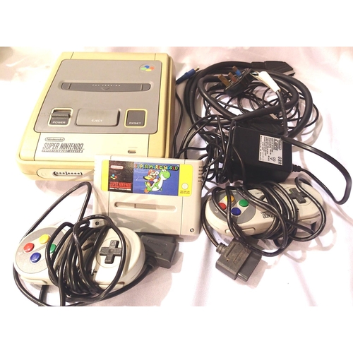 2208 - Super Nintendo console with x2 control pads, leads etc and Super Mario World game. P&P Group 2 (£18+... 