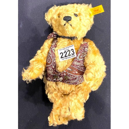 2223 - Steiff bear with waistcoat, H: 23 cm. P&P Group 2 (£18+VAT for the first lot and £3+VAT for subseque... 