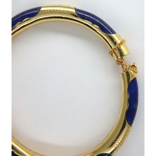 17 - Yellow metal bound lapis lazuli snap bangle with guard chain, unmarked, D: 74 mm, 26g. P&P Group 1 (... 