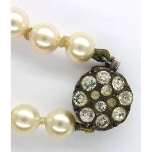 62 - Synthetic pearl necklace on a 9ct gold clasp, L: 38 cm, 18.0g. P&P Group 1 (£14+VAT for the first lo... 