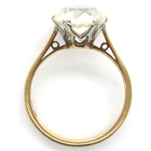 64 - Platinum set solitaire ring with a 9ct gold shank, size P, 3.1g. P&P Group 1 (£14+VAT for the first ... 