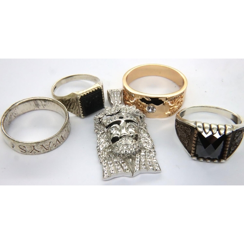 66 - Collection of 925 silver jewellery to include three rings, a pendant and a yellow metal ring. P&P Gr... 