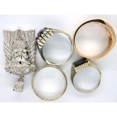 66 - Collection of 925 silver jewellery to include three rings, a pendant and a yellow metal ring. P&P Gr... 