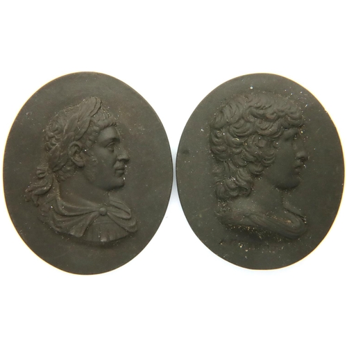 74 - Pair of black basalt oval busts, D: 45 mm, one engraved Antonius. P&P Group 1 (£14+VAT for the first... 