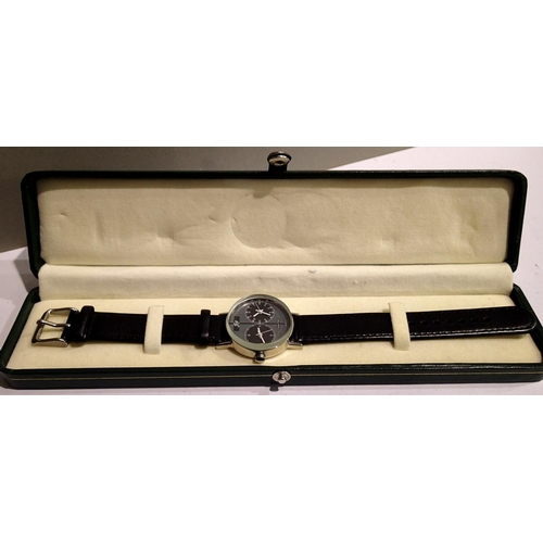 1083 - Dual time quartz wristwatch with black face and black leather strap, boxed, working at lotting. P&P ... 