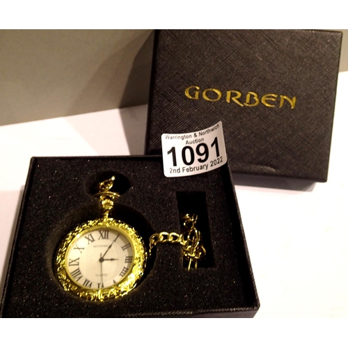 1091 - Gorben; gents open face pocket watch and chain, roman numerals to white face, gold body and chain, n... 