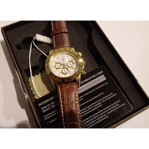 1092 - Kronen and Sohne; gents automatic sports wristwatch with white dial, gold bevel and brown leather st... 