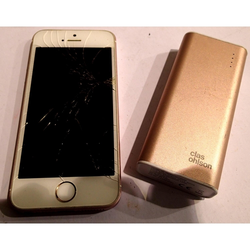 1094 - Rose gold iPhone SE in need of new screen with Clahs Olsen portable charger. P&P Group 1 (£14+VAT fo... 