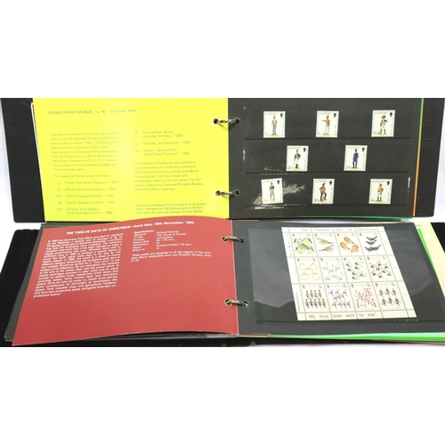 367 - Collection of over forty Guernsey stamp presentation packs, all complete mint stamp issues. P&P Grou... 