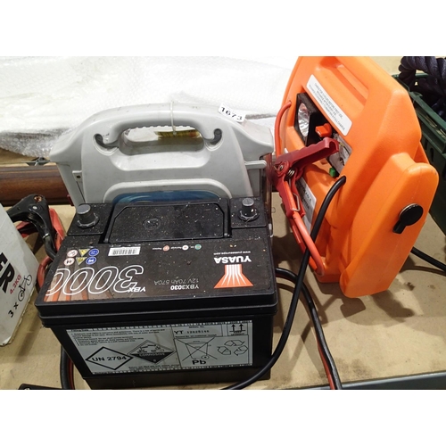 1673 - Two power starter units (both require attention) and an uncharged car battery. Not available for in-... 