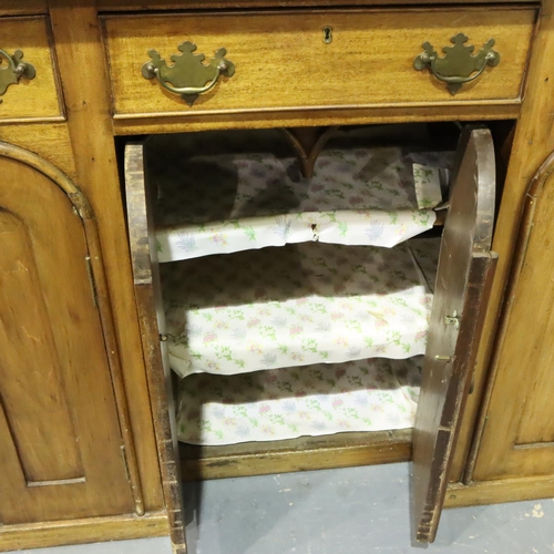 3065 - Substantial Victorian walnut dresser comprising a sideboard base of cupboards and drawers below a th... 