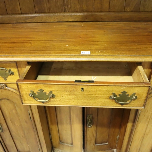 3065 - Substantial Victorian walnut dresser comprising a sideboard base of cupboards and drawers below a th... 