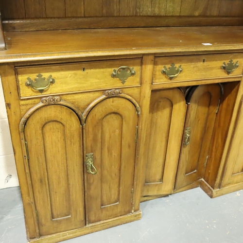 3065 - Substantial Victorian walnut dresser comprising a sideboard base of cupboards and drawers below a th... 