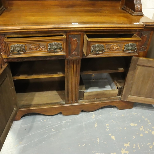 3066 - Victorian mahogany mirror back sideboard, the base having two carved cupboard doors and two short dr... 