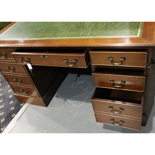 3069 - 20th century mahogany twin pedestal desk with tooled green leather insert with key, 137 x 76 x 76 cm... 