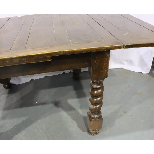 3080 - Early 20th century oak draw leaf dining table raised on four substantial twist supports, 180 x 106 x... 