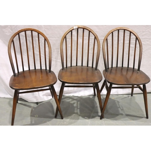 3103 - Set of four dark Ercol stick back dining chairs, with a further pair of similar Ercol chairs, three ... 