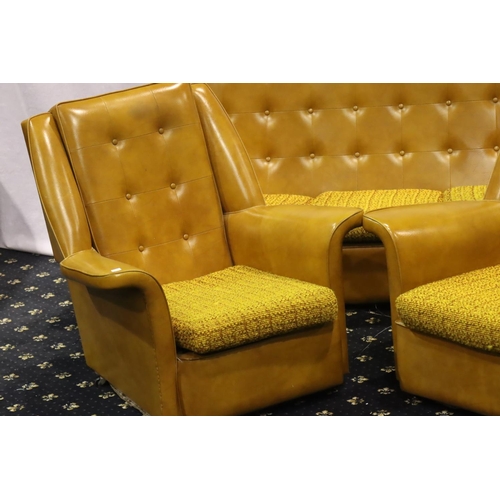 3105 - 1970s three piece lounge suite in tan vinyl and upholstered seat cushions comprising two armchairs a... 