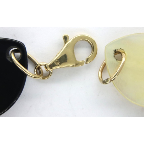 18 - Contemporary bracelet formed with alternating panels of onyx and mother of pearl, with 9ct gold clas... 