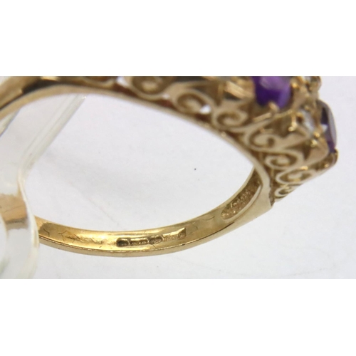 26 - 9ct gold amethyst and white stone set ring, size M/N, 2.4g. P&P Group 1 (£14+VAT for the first lot a... 