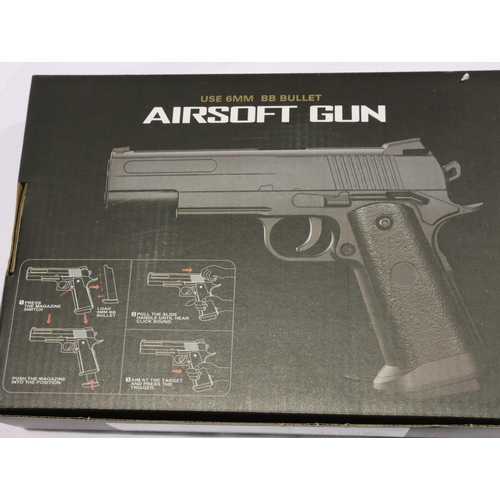 2005 - Boxed airsoft V18 brown pistol. P&P Group 1 (£14+VAT for the first lot and £1+VAT for subsequent lot... 