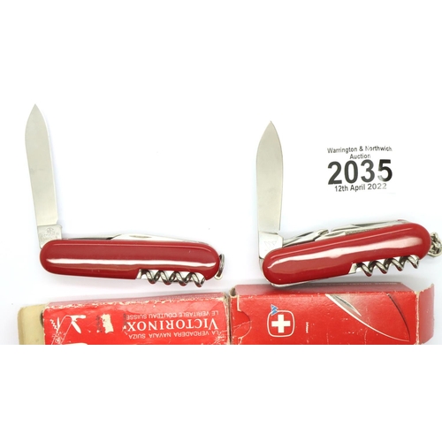 2035 - Two boxed Victorinox and Wenger Swiss army knives. P&P Group 1 (£14+VAT for the first lot and £1+VAT... 