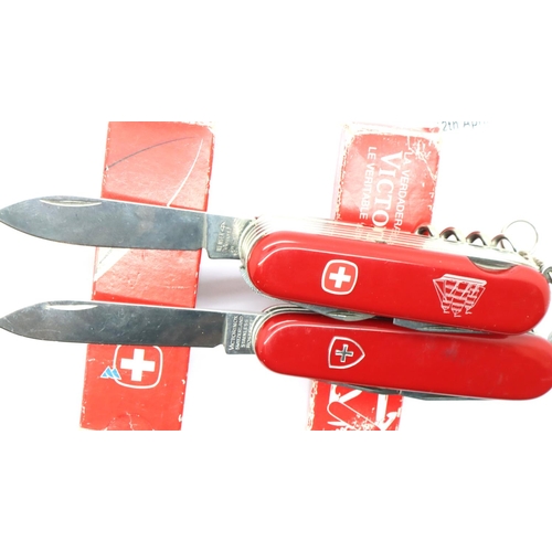 2035 - Two boxed Victorinox and Wenger Swiss army knives. P&P Group 1 (£14+VAT for the first lot and £1+VAT... 