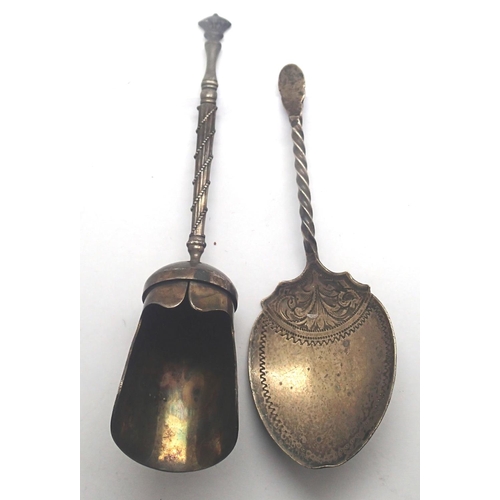 114 - Hallmarked silver caddy spoon and a white metal sugar scoop, combined 30g. P&P Group 1 (£14+VAT for ... 