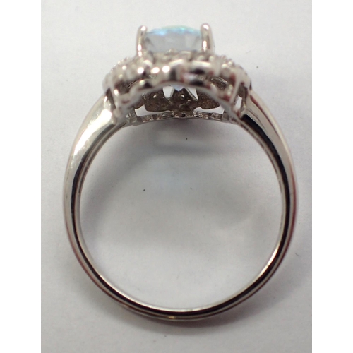 25 - 9ct white gold stone set cluster ring, size P, 3.4g. P&P Group 1 (£14+VAT for the first lot and £1+V... 