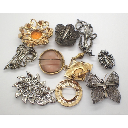 58 - Ten costume jewellery brooches to include a butterfly example. P&P Group 1 (£14+VAT for the first lo... 