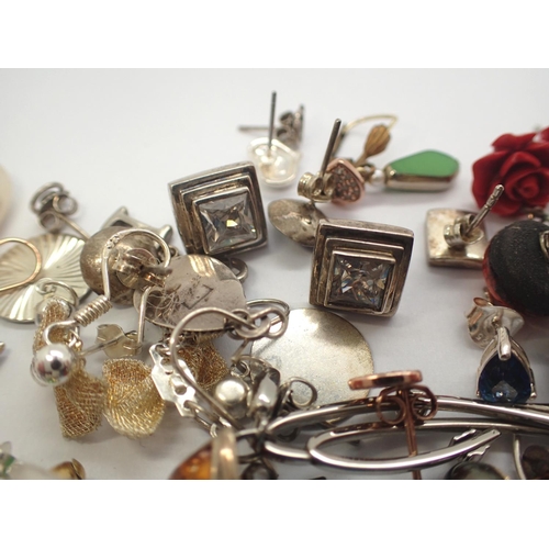 63 - Collection of mixed earrings to include stone set examples. P&P Group 1 (£14+VAT for the first lot a... 