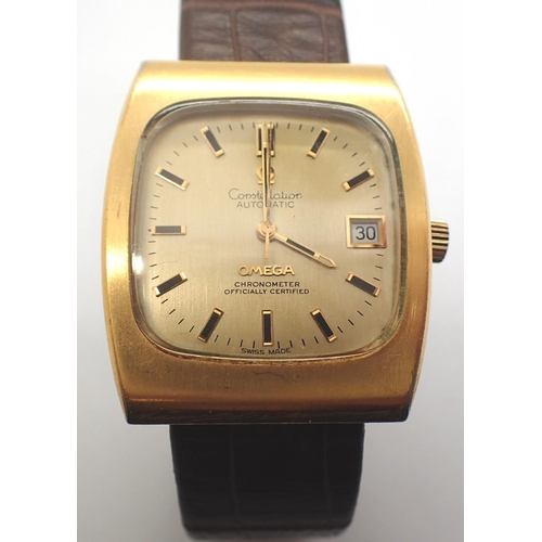 65 - Omega; gents Constellation Chronometer wristwatch with square gold face, date aperture on brown leat... 