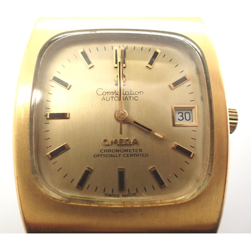 65 - Omega; gents Constellation Chronometer wristwatch with square gold face, date aperture on brown leat... 