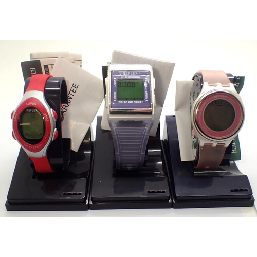 66 - Three Reflex wristwatches, all on rubber straps, not working at lotting. P&P Group 1 (£14+VAT for th... 