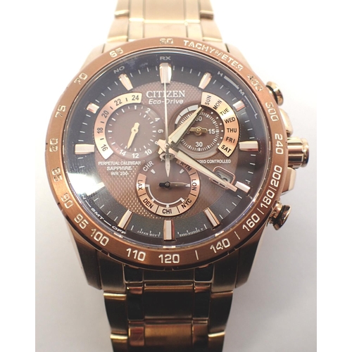 69 - Citizen; Eco Drive perpetual calendar wristwatch with sapphire bronze dial and gold stainless steel ... 