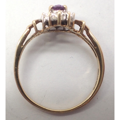 7 - 9ct gold diamond and amethyst daisy ring, size S/T, 2.0g. P&P Group 1 (£14+VAT for the first lot and... 