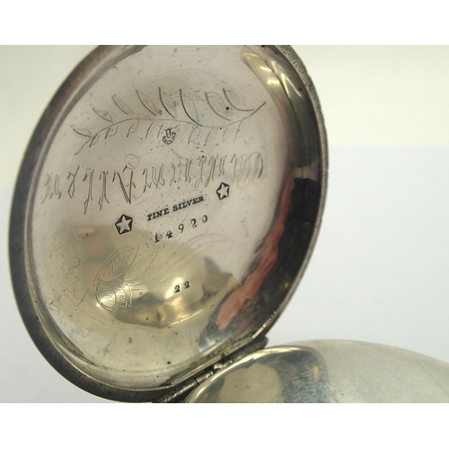 77 - Silver key wind open face pocket watch in a fine silver case, with key, working at lotting. Case D: ... 