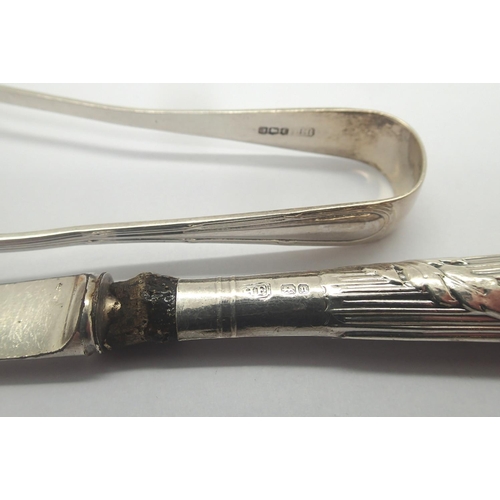 92 - Two hallmarked pairs of sugar tongs and a hallmarked silver spoon, combined 85g. P&P Group 1 (£14+VA... 