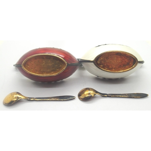 93 - Pair of Norwegian red and white enamelled 925 silver gilt salts with glass liners and spoons, no los... 