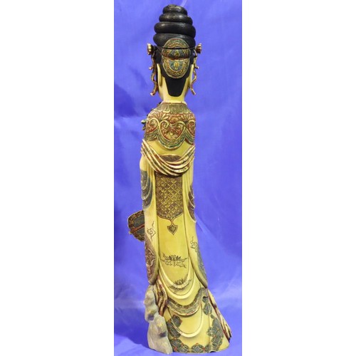 376 - Tall polychrome ivory female figurine holding fan with character mark to base, H: 530 mm, split to f... 