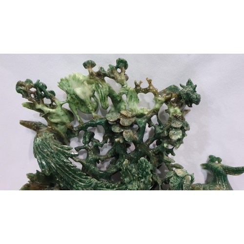 393 - Large Chinese carved jadeite tableau depicting pheasants and cranes within foliage, raised on stand,... 