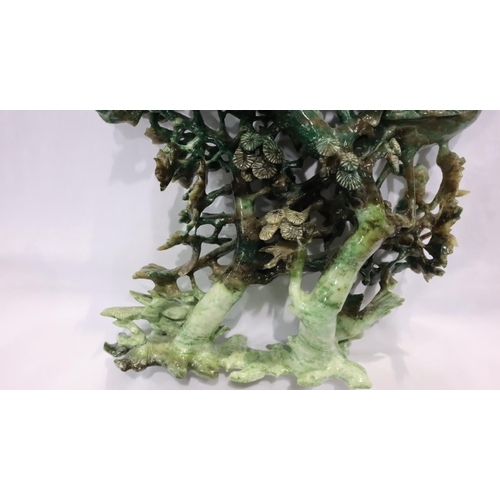 393 - Large Chinese carved jadeite tableau depicting pheasants and cranes within foliage, raised on stand,... 