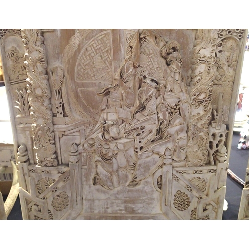 377 - Carved Oriental wooden three panel screen with two similar hanging panels, H: 91 cm. Not available f... 