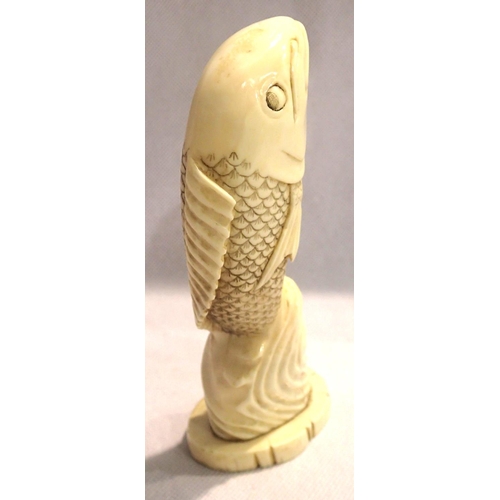 387 - Antique carved ivory leaping carp, signed to base, H: 15cm. P&P Group 1 (£14+VAT for the first lot a... 