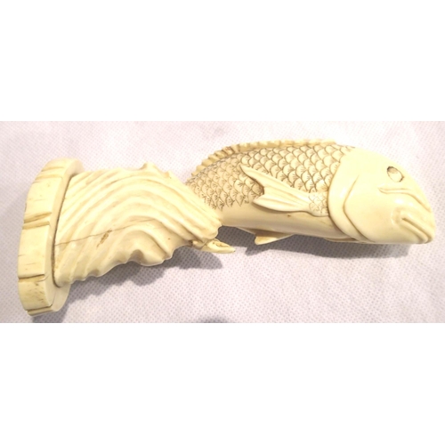 387 - Antique carved ivory leaping carp, signed to base, H: 15cm. P&P Group 1 (£14+VAT for the first lot a... 